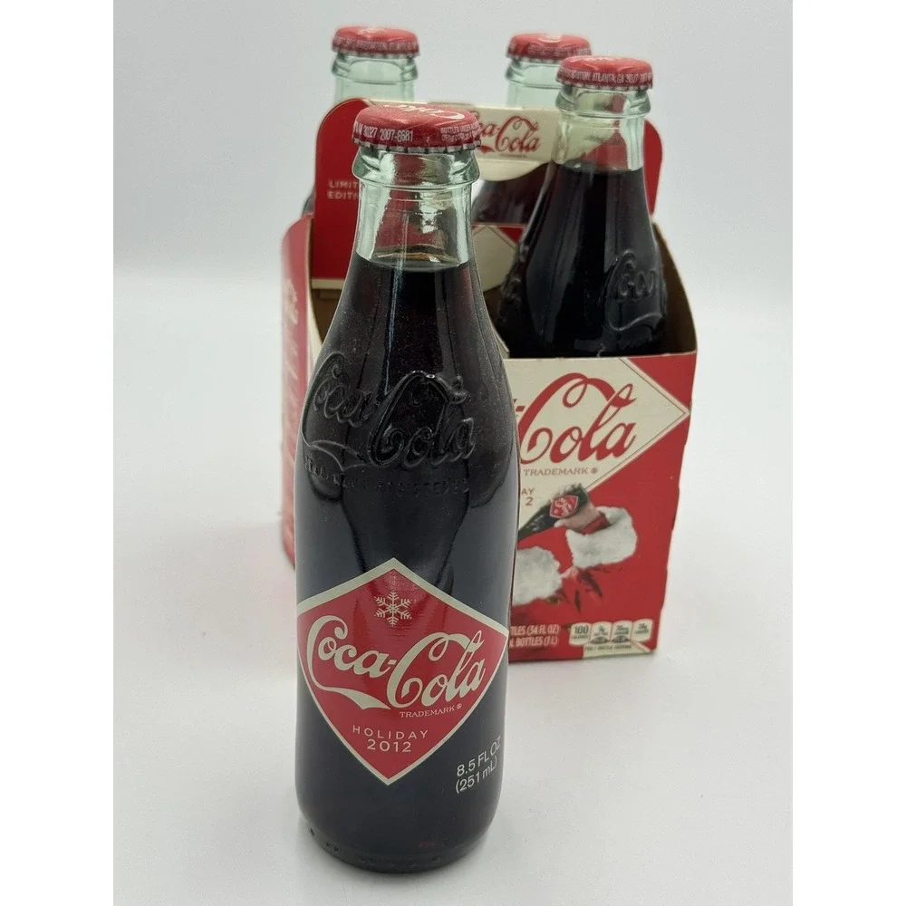 4 Pack of 2012 Coca-Cola Coke Christmas Santa Claus Holiday Full Bottles